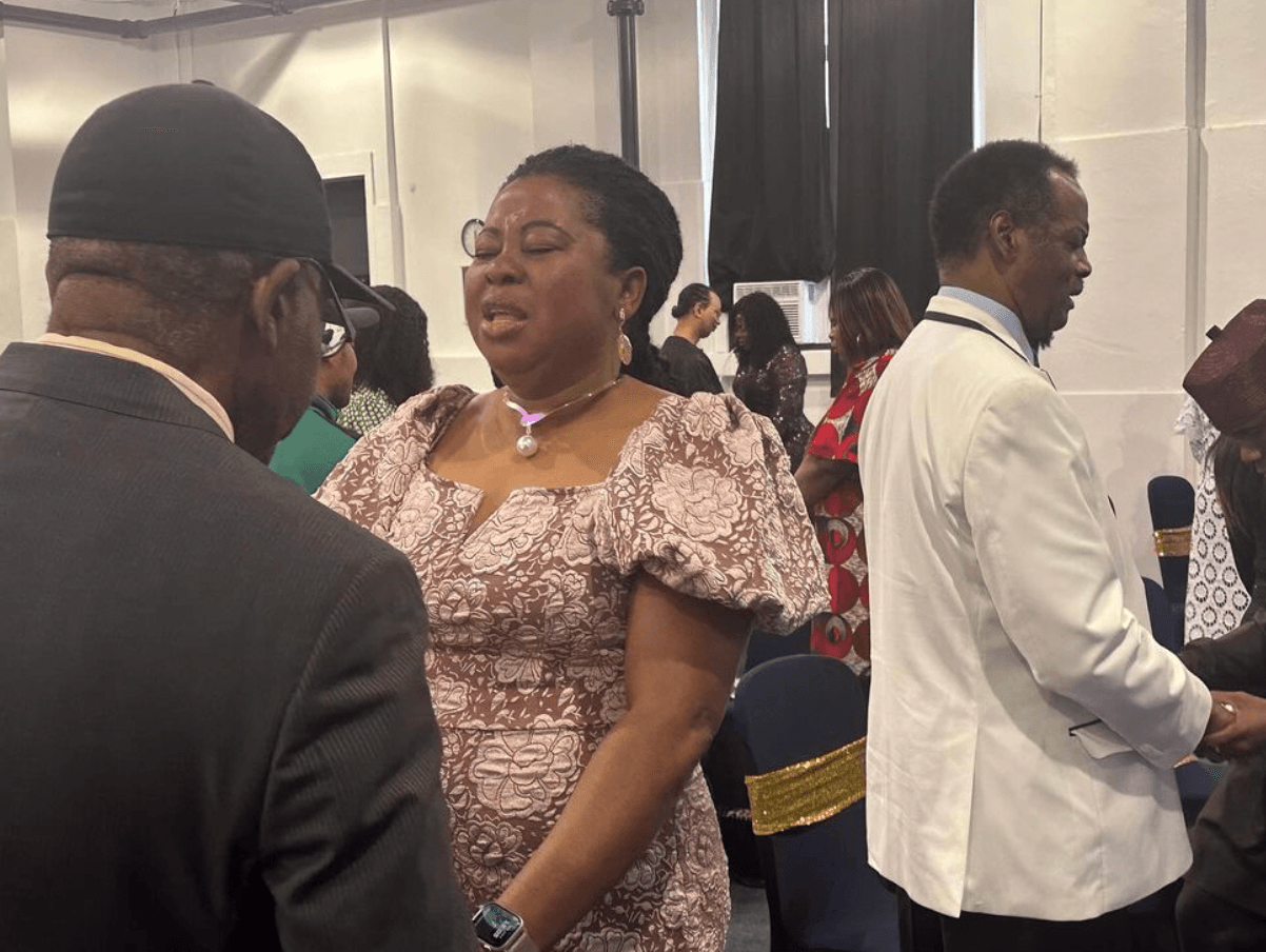 Members of Christ Embassy Chicago in prayer