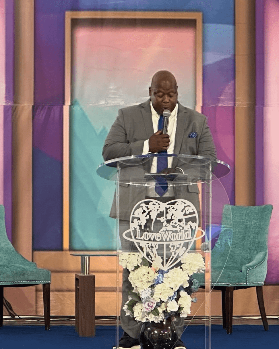 A minister speaking at the pulpit at Christ Embassy Chicago